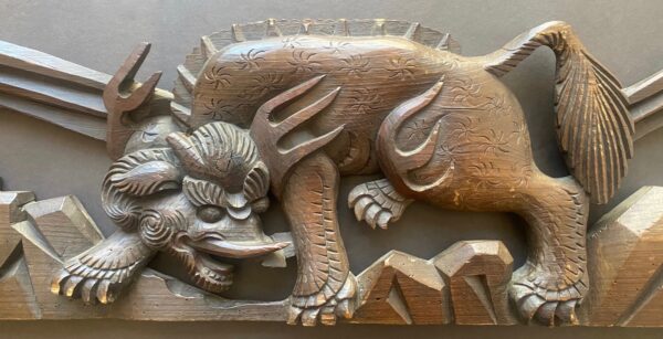 Japanese antique Baku carving for temple. The mythical creature, part lion, part elephant with clouds.