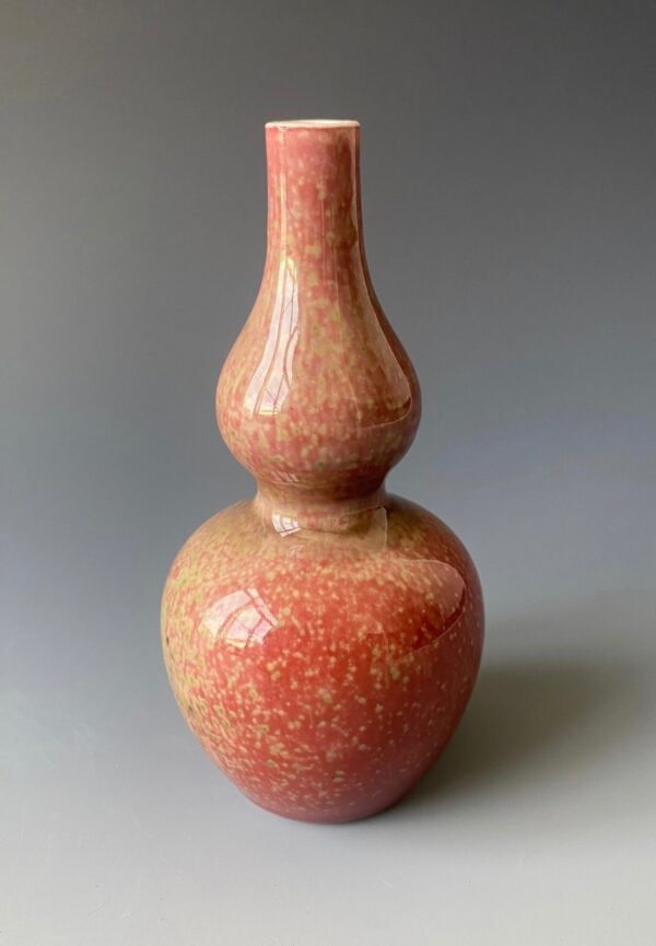 Chinese antique monochrome porcelain gourd shaped vase with "peach bloom" glaze. Light red mottled with light green glaze.
