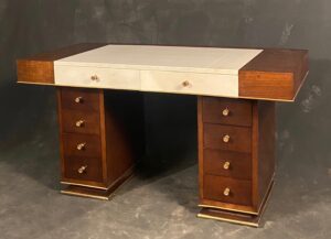 Antique French Art Deco pedestal desk. Made of hardwood with dramatically striated grain.