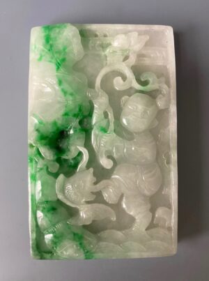 Chinese nephrite jade pendant of boy and fish