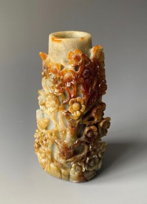 Chinese jade vase carved with flowers and birds