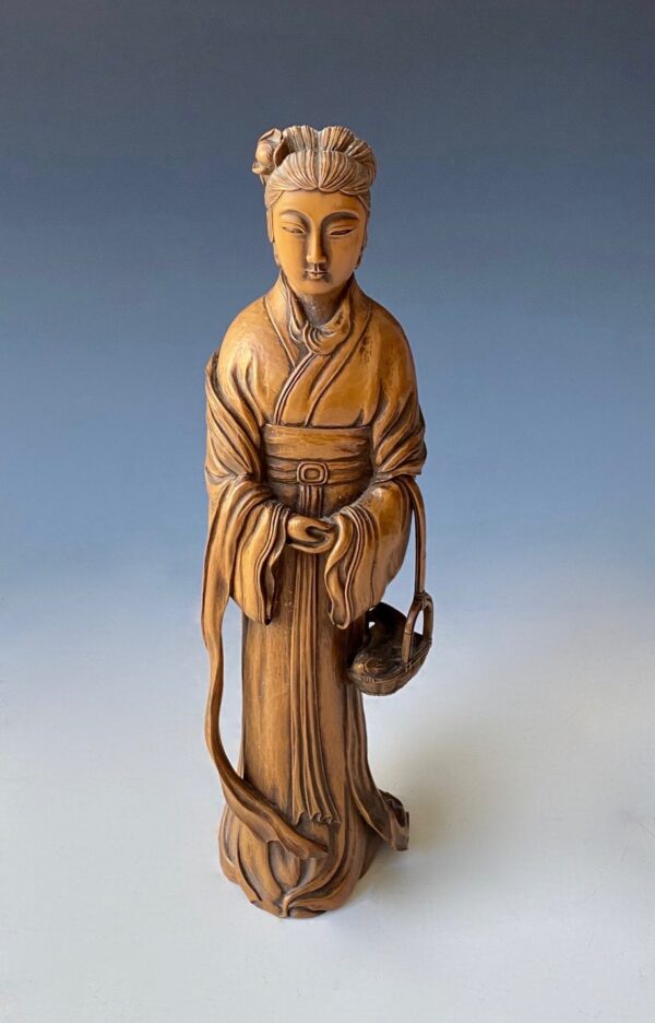 Japanese antique boxwood carving of Yulan Guanyin with fish basket
