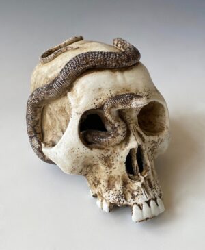 Antique Japanese porcelain skull and snake okimono