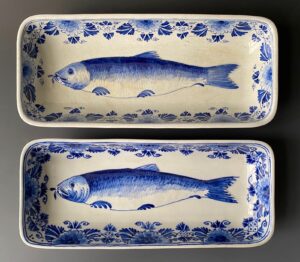 Pair of antique Delft ware blue and white porcelain fish plates