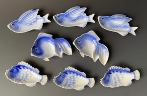 Japanese set of 8 small porcelain plates of various fish