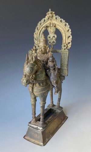 Indian antique bronze statue of the Hindu deities, Shiva and Parvati on horseback